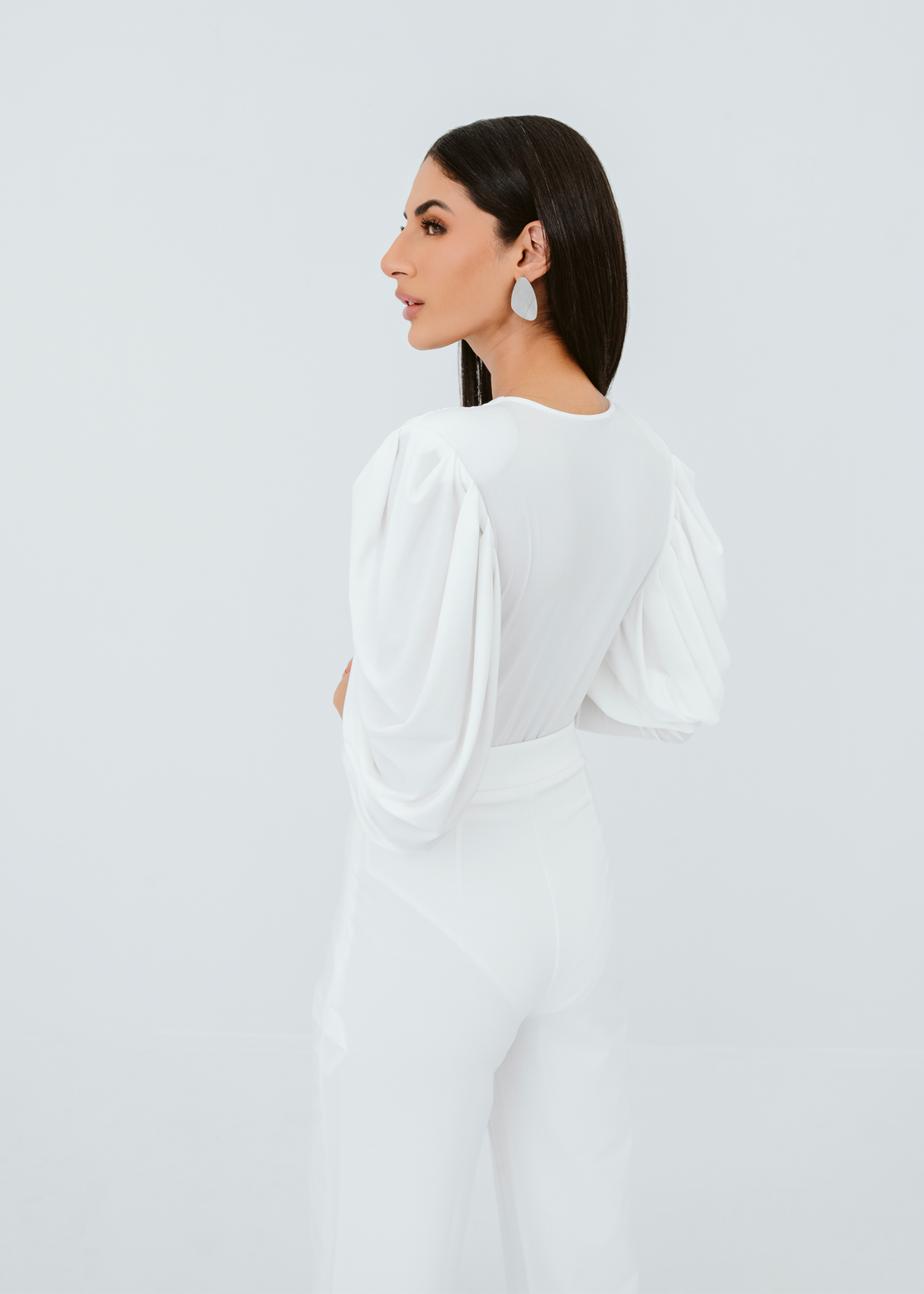 Gathered sleeves bodysuit with crystal brooch